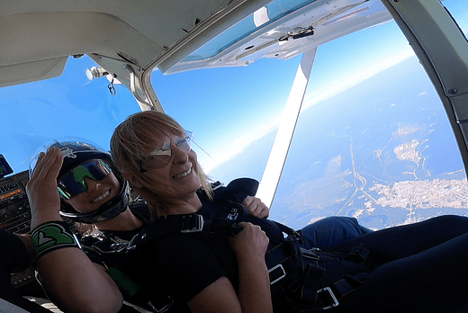 first-time-tandem-female-women-skydivers-in-the-door